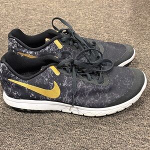 Women’s Nike Black and Gold Running Shoes 8